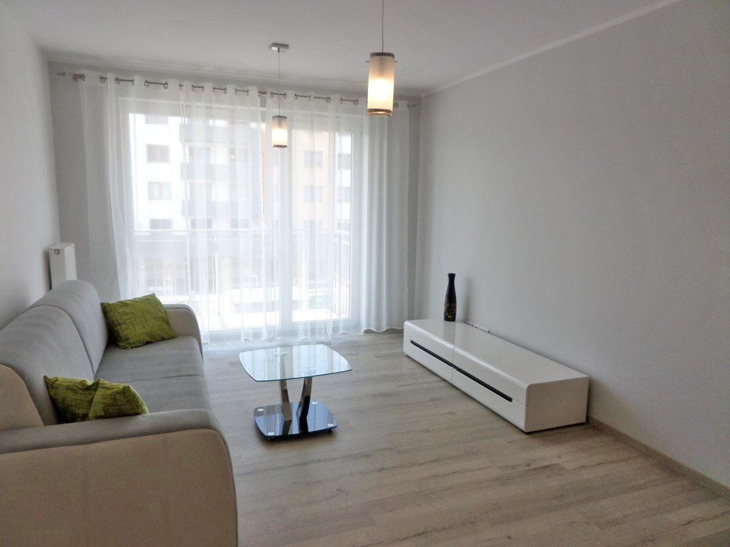 zdjęcie przedstawia nowoczesny salon w mieszkaniu na wynajem we Wrocławiu