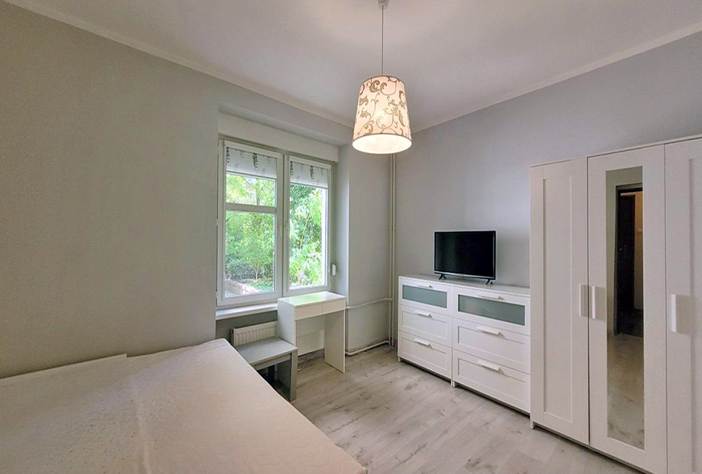 elegancka sypialnia w mieszkaniu na sprzedaż Wrocław